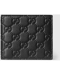 Gucci - Gg Emblem Bi-Fold Wallet - Lyst