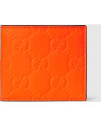 Gucci - GG ラバーエフェクト 二つ折りウォレット, オレンジ, Leather - Lyst
