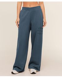 GYMSHARK - Stacked Graphic Wide Leg Joggers - Lyst