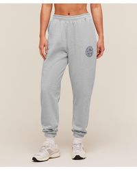 GYMSHARK - Strength And Fitness Crest Graphic Joggers - Lyst