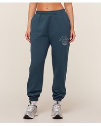 GYMSHARK - Worn Crest Graphic Joggers - Lyst