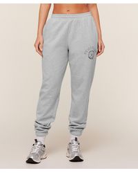 GYMSHARK - Worn Crest Graphic Joggers - Lyst
