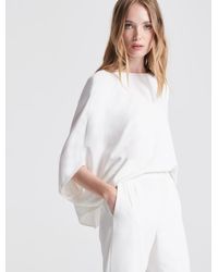 Halston Draped Sleeve Tapered Leg Crepe Jumpsuit - White