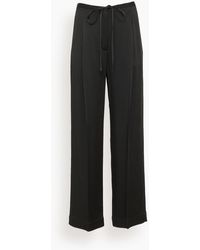 Rohe - Relaxed Drawstring Satin Trousers - Lyst