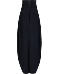 Alaïa - High-Rise Curved-Leg Trousers - Lyst