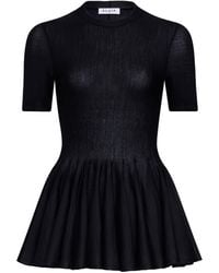 Alaïa - Virgin Wool Peplum Top - Lyst