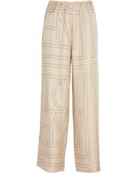 TOTEME - Silk Monogram Trousers - Lyst