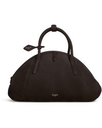 Alaïa - Leather Purse Top-Handle Bag - Lyst