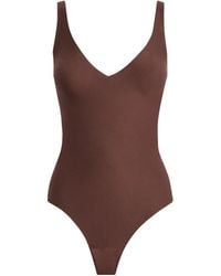 Skims - Unlined Plunge Thong Bodysuit - Lyst