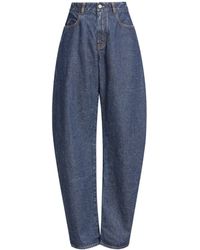 Alaïa - Round Low-Rise Wide-Leg Jeans - Lyst