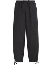 TOTEME - Cotton Drawstring Trousers - Lyst