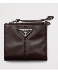 Prada - Small Leather Zipped Wallet - Lyst
