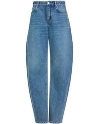 Alaïa - Round Wide-Leg Jeans - Lyst