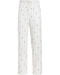 Dolce & Gabbana - Cotton-Blend Logo Trousers - Lyst