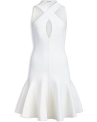 Alaïa - Knitted Cross-Front Mini Dress - Lyst