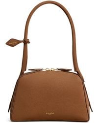 Alaïa - Small Leather Le Bouledogue Shoulder Bag - Lyst
