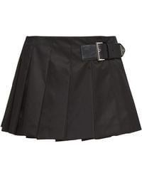 Prada - Pleated Gabardine Miniskirt - Lyst