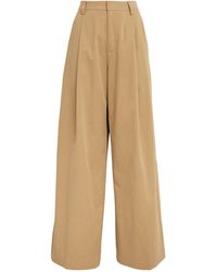 FRAME - Pleated Wide-leg Trousers - Lyst