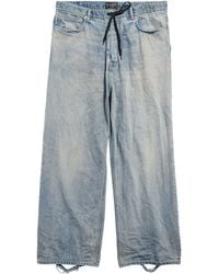 Balenciaga - Distressed Drawstring Wide-leg Jeans - Lyst