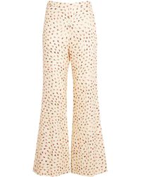 Sandro - Floral Print Flared Trousers - Lyst