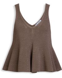 Alaïa - Silk Knit Peplum Top - Lyst