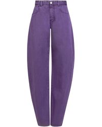 Alaïa - Round High-Rise Wide-Leg Jeans - Lyst