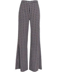 Sandro - Floral Print Flared Trousers - Lyst