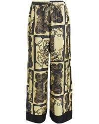 Ganni - Silk Ornate Print Trousers - Lyst