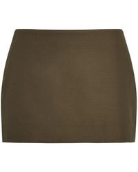 KHAITE - Leather Jett Mini Skirt - Lyst