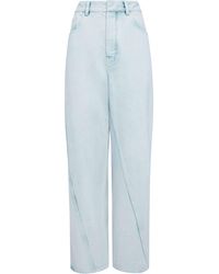 Alaïa - Twisted Straight-Leg Jeans - Lyst