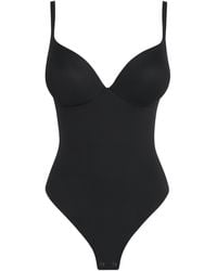 Skims - Ultimate Body Thong Bodysuit - Lyst