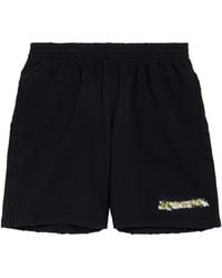 Balenciaga - Cotton Messy Spray Logo Shorts - Lyst