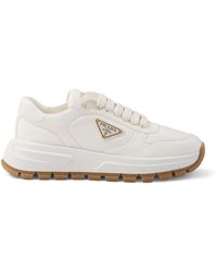 Prada - Leather Triangle Sneakers - Lyst