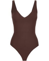 Skims - Plunge Thong Bodysuit - Lyst