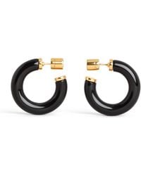 Alaïa - Ray Hoop Earrings - Lyst