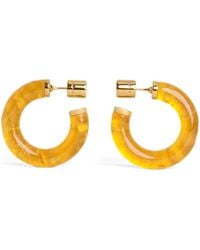 Alaïa - Ray Hoop Earrings - Lyst