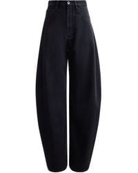 Alaïa - Round Wide-Leg Jeans - Lyst