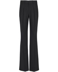 Balmain - Virgin Wool Pleated Flared Trousers - Lyst