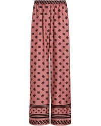 Dolce & Gabbana - Silk Logo Print Wide-Leg Trousers - Lyst