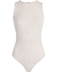 Wolford - Infinite Rose Net Bodysuit - Lyst