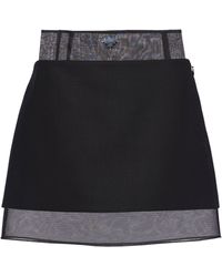 Prada - Logo-plaque Wool Miniskirt - Lyst