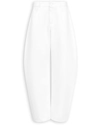 Alaïa - Round Wide-Leg Jeans - Lyst
