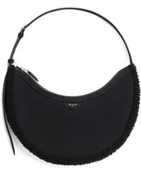Alaïa - Small Shearling One Piece Demi Lune Shoulder Bag - Lyst