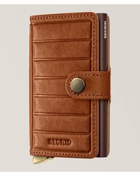 Secrid - Embossed Lines Leather Rfid Mini Wallet - Lyst