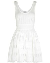 Alaïa - Alaïa Fluid Knitted Mini Dress - Lyst