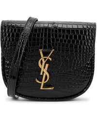 kaia baby leather saddle crossbody bolsa