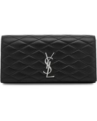 Saint Laurent - Logo Quilted Leather Clutch - Lyst