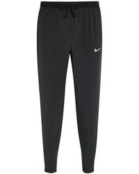 Nike - Dri-Fit Woven Running Trousers - Lyst