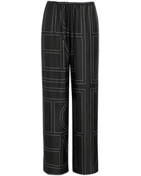 TOTEME - Logo-Embroidered Silk-Satin Trousers - Lyst
