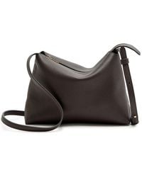 KHAITE - Lina Medium Leather Cross-Body Bag - Lyst